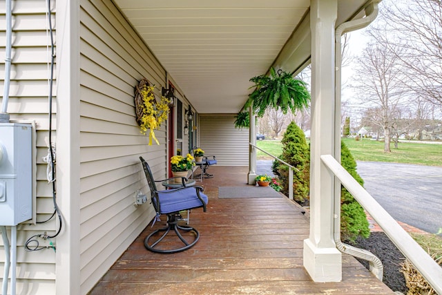 wooden terrace with covered porch
