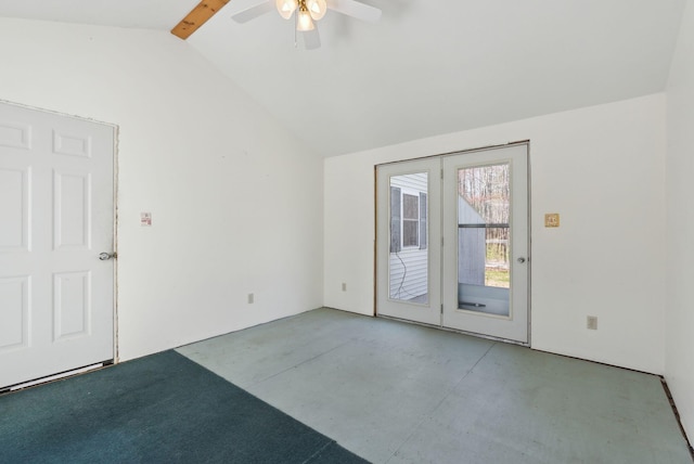 unfurnished room with french doors, ceiling fan, vaulted ceiling, and finished concrete floors