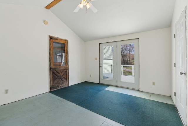 interior space featuring vaulted ceiling with beams, a ceiling fan, and french doors