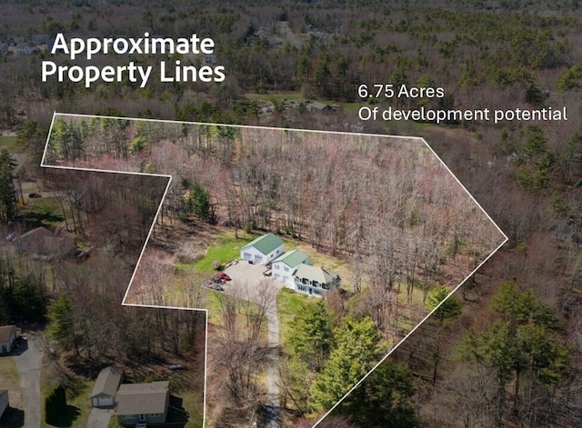 aerial view featuring a view of trees