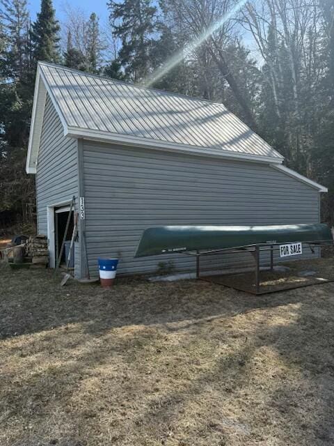view of property exterior with metal roof
