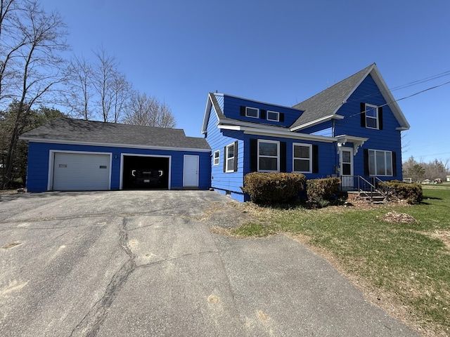 94 Dexter Rd, Corinna, ME 04928 - view of front of house with driveway and a front yard