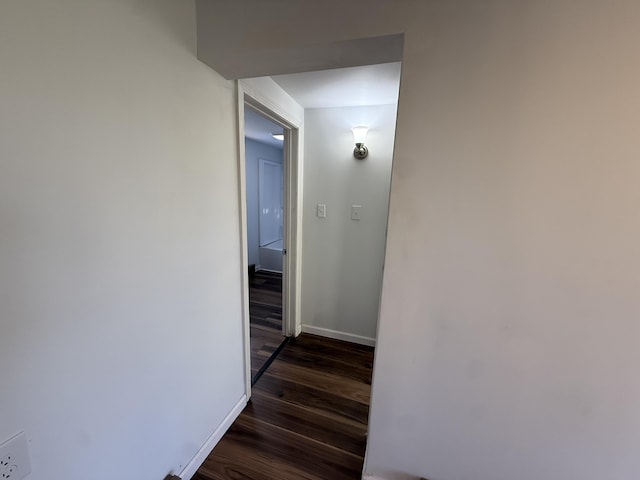 94 Dexter Rd, Corinna, ME 04928 - corridor featuring baseboards and dark wood finished floors
