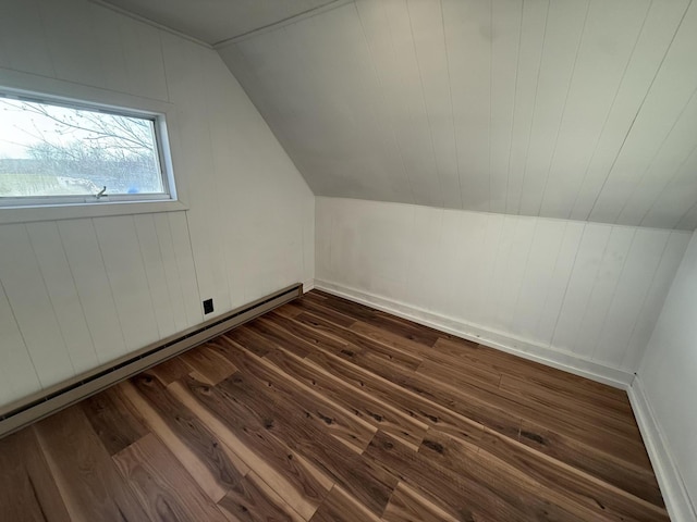 94 Dexter Rd, Corinna, ME 04928 - additional living space with baseboards, dark wood finished floors, baseboard heating, and lofted ceiling