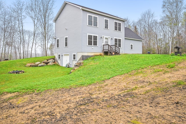 66 Balsam Dr, Windsor, ME 04363 - rear view of house featuring a lawn