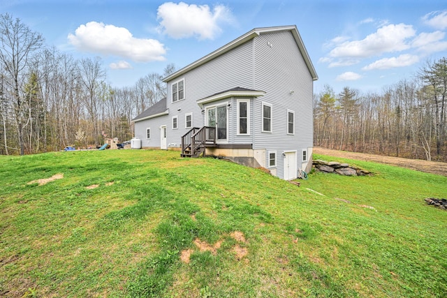 66 Balsam Dr, Windsor, ME 04363 - rear view of house featuring a yard