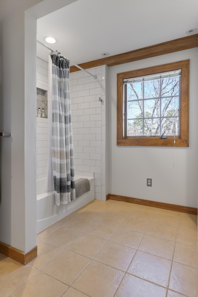 full bath with baseboards, tile patterned floors, shower / tub combo, and recessed lighting