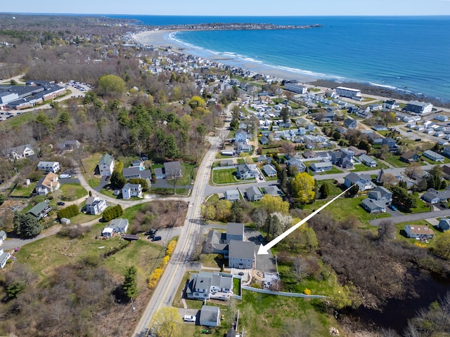 aerial overview of property's location featuring expansive coastline and nearby suburban area