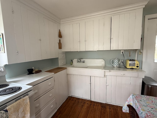 7 Mountain St, Vinalhaven, ME 04863 - kitchen featuring white electric range oven, a sink, light countertops, dark wood finished floors, and white cabinetry
