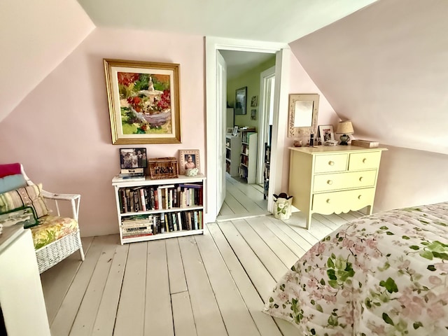 7 Mountain St, Vinalhaven, ME 04863 - bedroom with wood-type flooring and lofted ceiling
