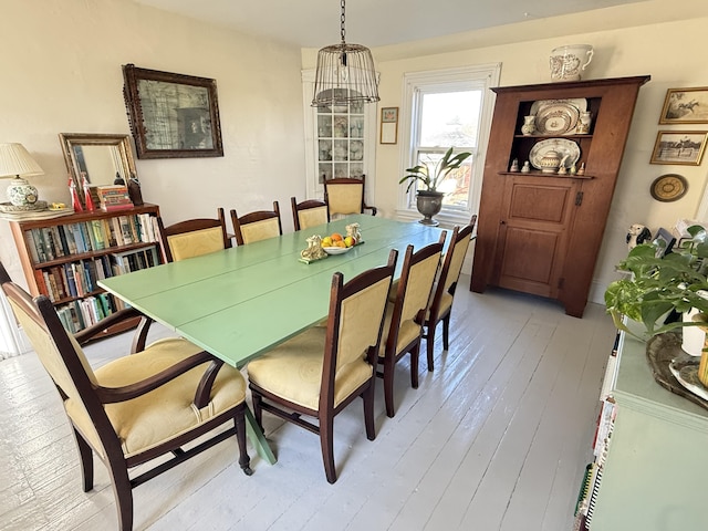 7 Mountain St, Vinalhaven, ME 04863 - dining room featuring light wood finished floors and a chandelier