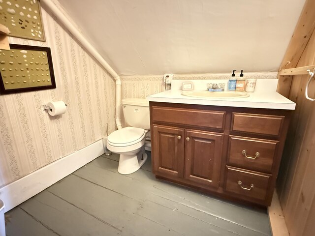 7 Mountain St, Vinalhaven, ME 04863 - half bathroom with wallpapered walls, toilet, and vanity
