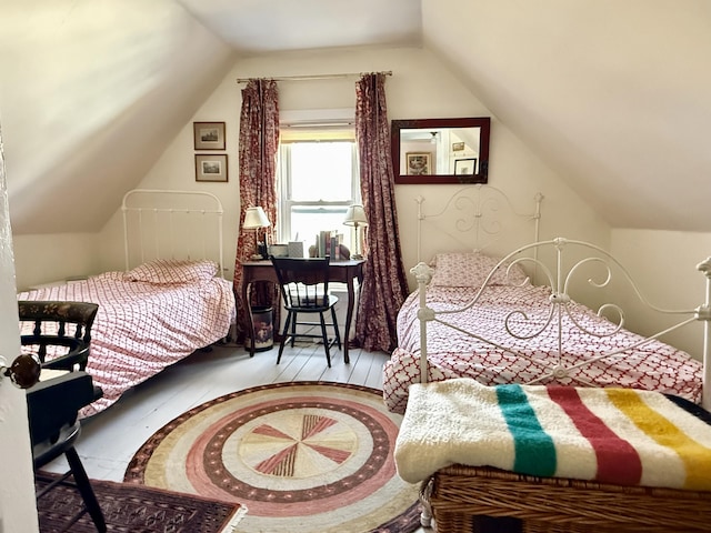 7 Mountain St, Vinalhaven, ME 04863 - bedroom with lofted ceiling and wood finished floors