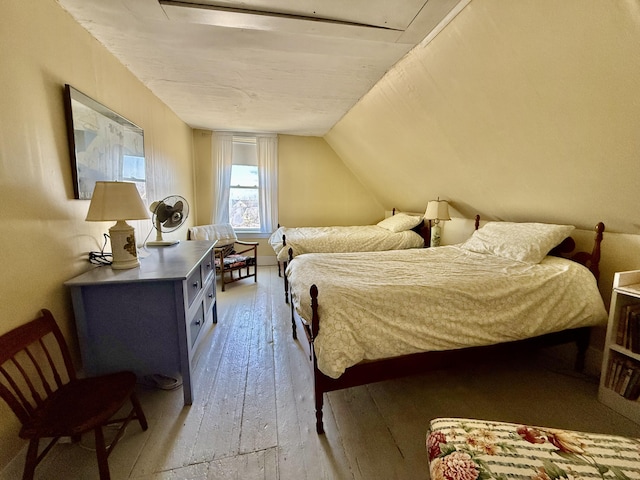 7 Mountain St, Vinalhaven, ME 04863 - bedroom with light wood-style flooring and lofted ceiling