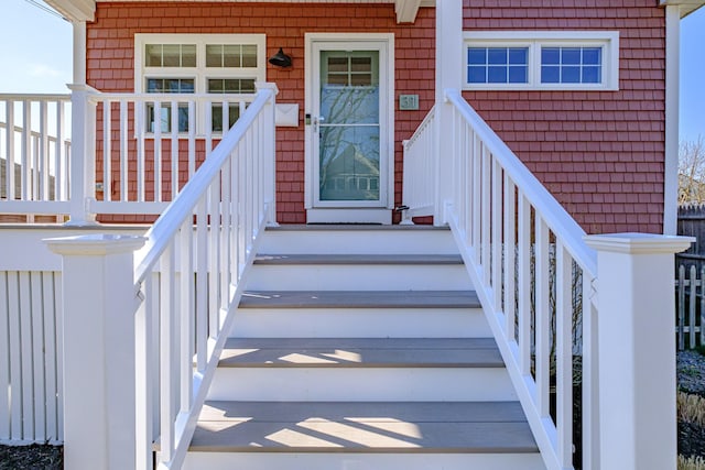 entrance to property featuring a porch