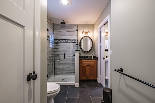 bathroom with vanity, marble finish floor, a stall shower, and toilet