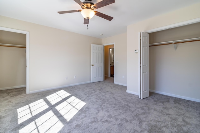 unfurnished bedroom featuring baseboards, ceiling fan, and carpet flooring
