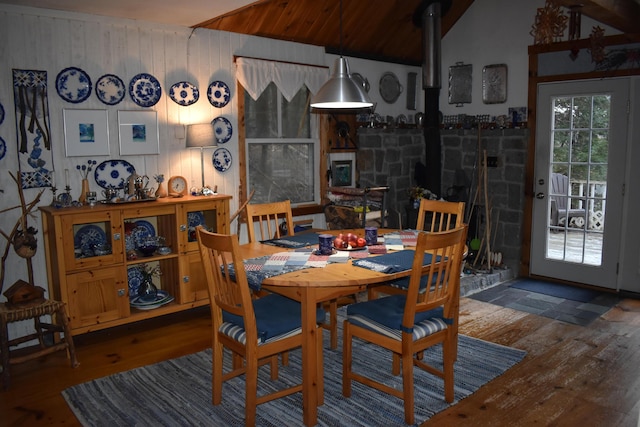 158 Old Stage Rd, Readfield, ME 04355 - dining space featuring a wood stove, hardwood / wood-style flooring, and lofted ceiling