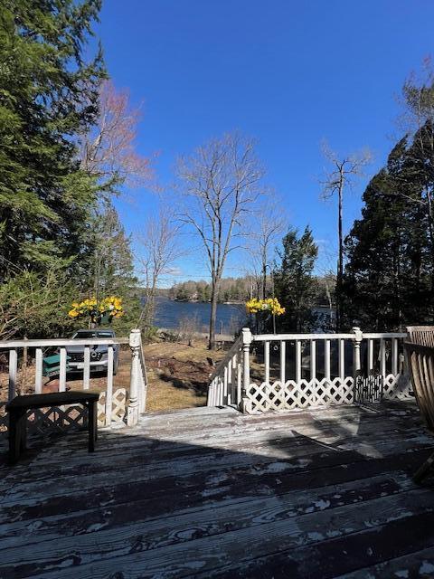 158 Old Stage Rd, Readfield, ME 04355 - wooden terrace with a water view