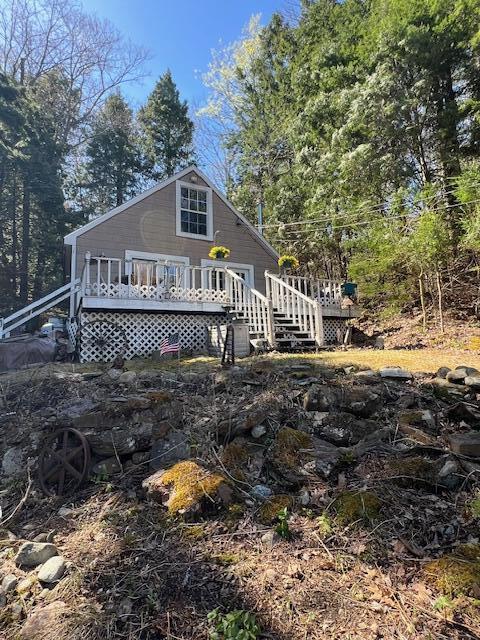 158 Old Stage Rd, Readfield, ME 04355 - back of property with a wooden deck