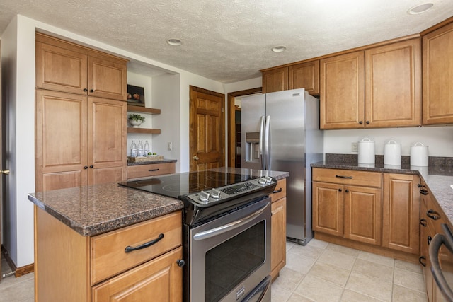 kitchen featuring open shelves, appliances with stainless steel finishes, brown cabinetry, and a center island