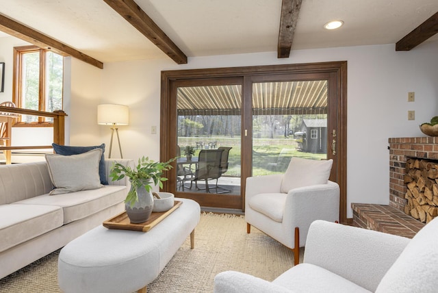 living area featuring recessed lighting and beam ceiling