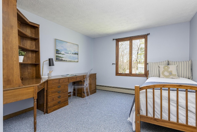 carpeted bedroom featuring a textured ceiling and baseboard heating