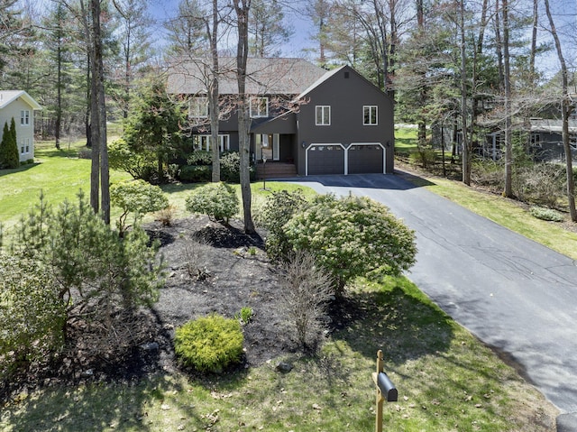 view of front of house with a garage and driveway