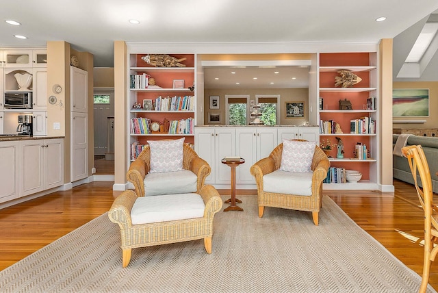 sitting room featuring recessed lighting and light wood-style floors