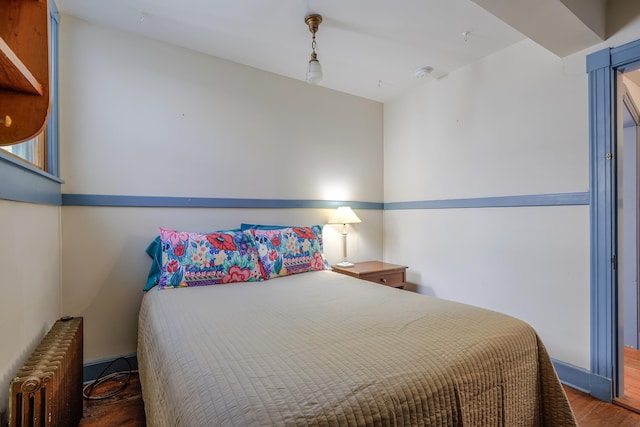 6 Sea St, Northeast Harbor, Mount Desert, ME 04662 - bedroom featuring radiator heating unit and wood finished floors