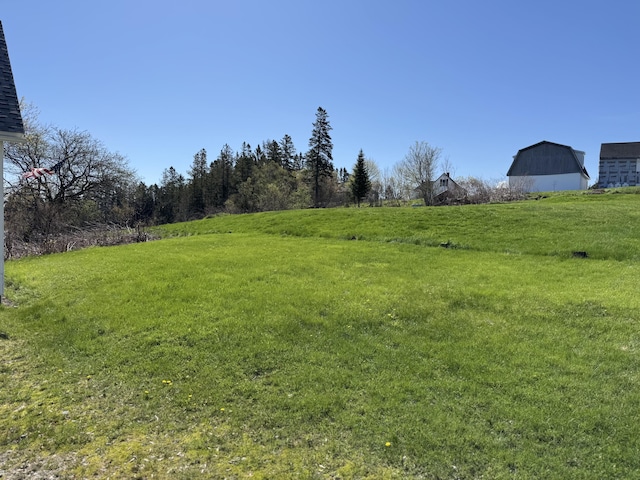 30 Mill St, Harrington, ME 04643 - view of grassy yard with an outdoor structure