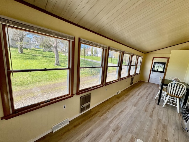 30 Mill St, Harrington, ME 04643 - unfurnished sunroom with lofted ceiling and heating unit