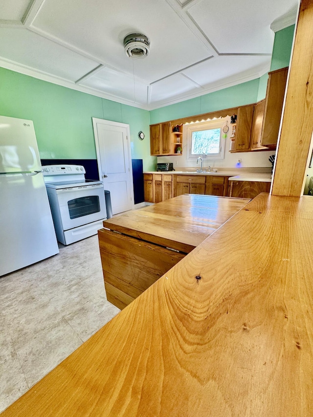 30 Mill St, Harrington, ME 04643 - kitchen featuring white appliances, brown cabinetry, open shelves, and wood counters