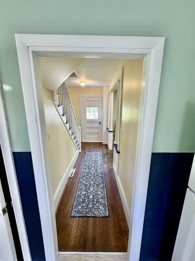 30 Mill St, Harrington, ME 04643 - doorway with dark wood-style floors, stairway, and baseboards