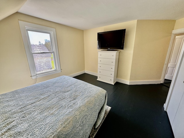 30 Mill St, Harrington, ME 04643 - bedroom featuring dark wood-style floors, baseboards, and lofted ceiling