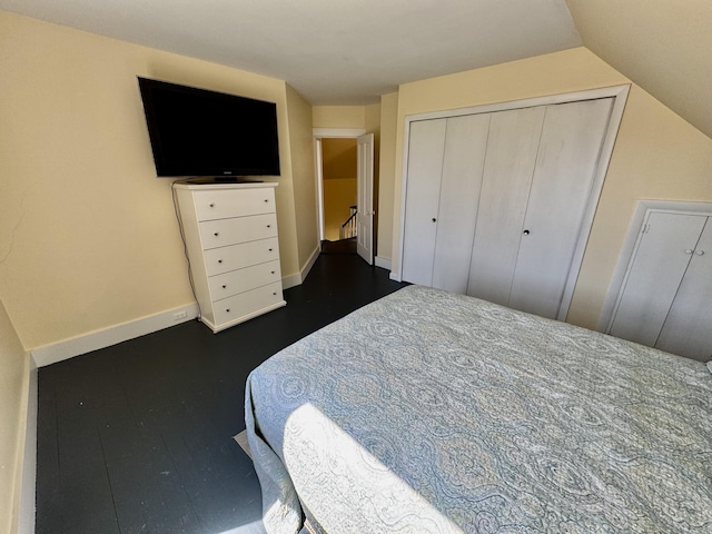 30 Mill St, Harrington, ME 04643 - bedroom with a closet, baseboards, vaulted ceiling, and dark wood finished floors