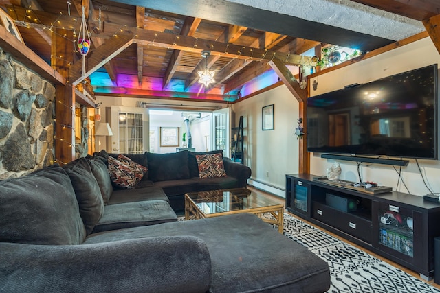 living area featuring a baseboard heating unit and beam ceiling