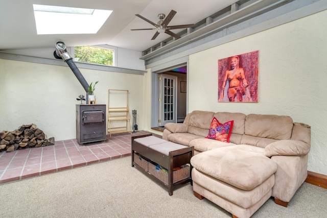 living room featuring carpet floors, ceiling fan, and lofted ceiling