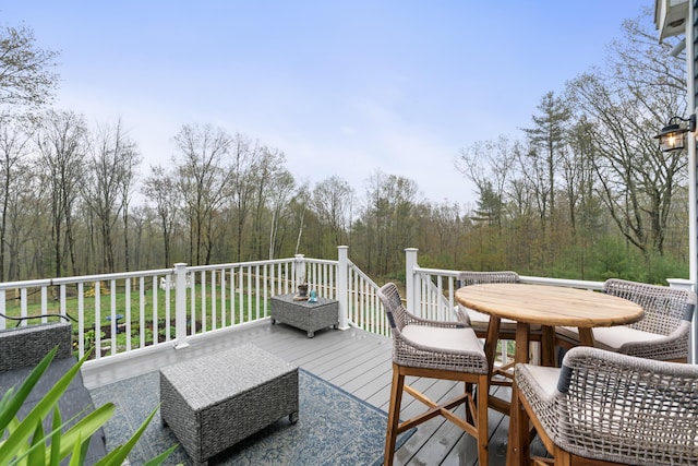 29 Hawks Nest Ln, Wells, ME 04090 - wooden deck featuring outdoor dining area