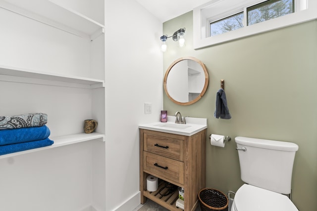 29 Hawks Nest Ln, Wells, ME 04090 - bathroom featuring vanity, toilet, and baseboards