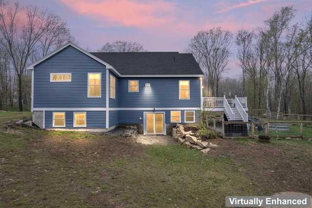 29 Hawks Nest Ln, Wells, ME 04090 - view of front of home with stairs, a wooden deck, and roof with shingles