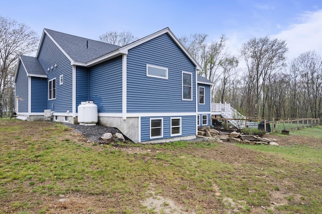 29 Hawks Nest Ln, Wells, ME 04090 - view of side of home with roof with shingles