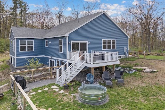 29 Hawks Nest Ln, Wells, ME 04090 - rear view of property with a wooden deck, roof with shingles, and stairs