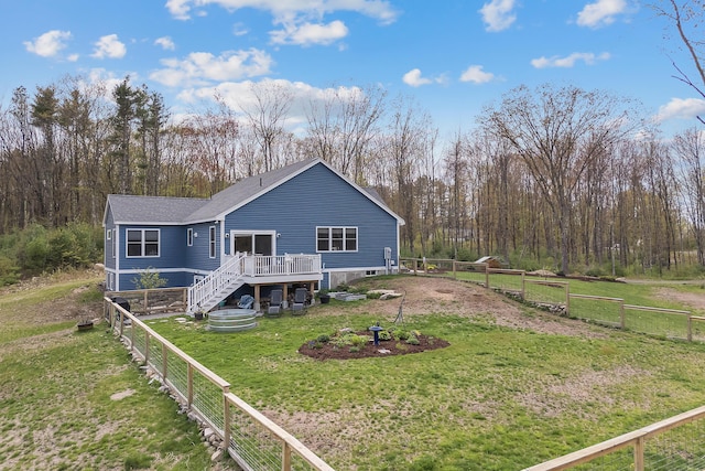 29 Hawks Nest Ln, Wells, ME 04090 - rear view of house featuring a wooden deck, stairs, and a shingled roof