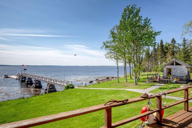 1588 Turtle Head Rd, Islesboro, ME 04848 - view of grassy yard with a water view and a dock