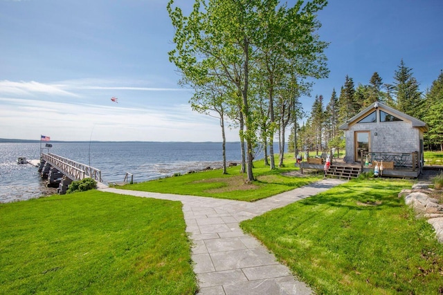 1588 Turtle Head Rd, Islesboro, ME 04848 - view of green lawn with a deck with water view