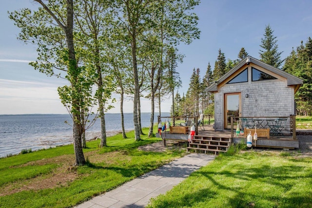 1588 Turtle Head Rd, Islesboro, ME 04848 - view of community featuring a deck with water view and a yard