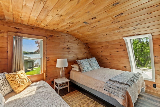 1588 Turtle Head Rd, Islesboro, ME 04848 - bedroom featuring lofted ceiling, wood walls, wood finished floors, wood ceiling, and a water view