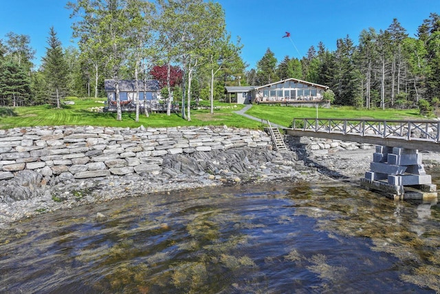 1588 Turtle Head Rd, Islesboro, ME 04848 - dock area featuring a water view, a yard, and a forest view