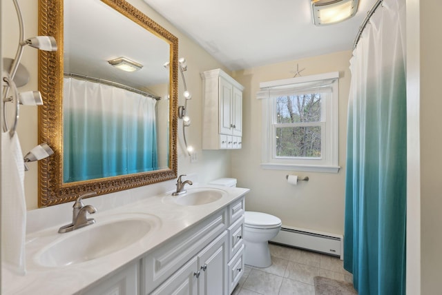 48 Woodside Dr, Kennebunk, ME 04043 - full bath with a baseboard radiator, toilet, tile patterned floors, and double vanity
